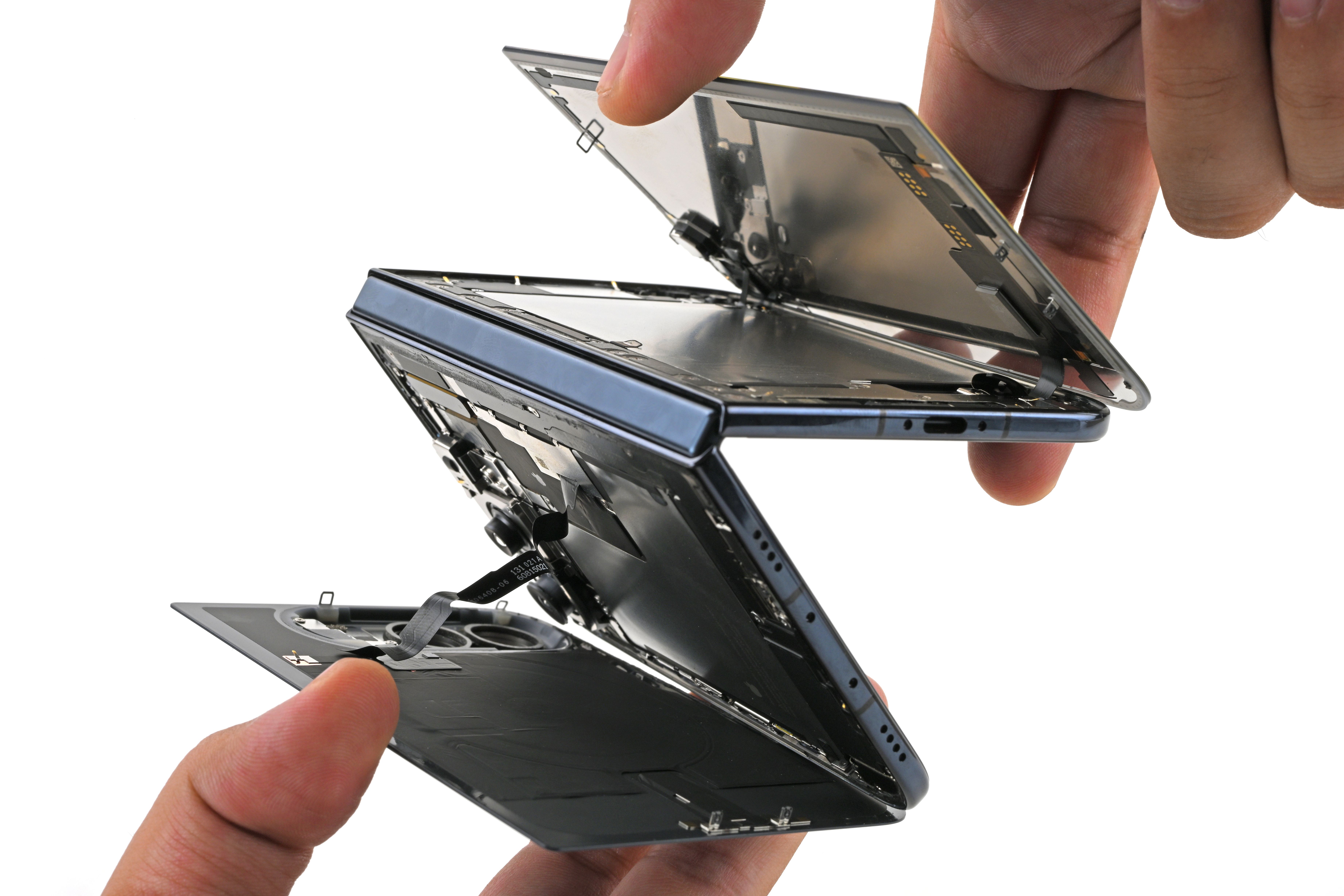 Some iPhone Duo Models Are Breaking. iFixit’s Teardown Might Explain Why — Wired, Chicago Business news